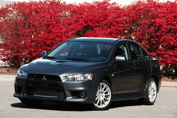 Мицубиси 10 года. Mitsubishi Lancer 2010. Mitsubishi Lancer Lancer 2010. Mitsubishi Lancer x 2010. Митсубиси Лансер Эволюшн 2010.