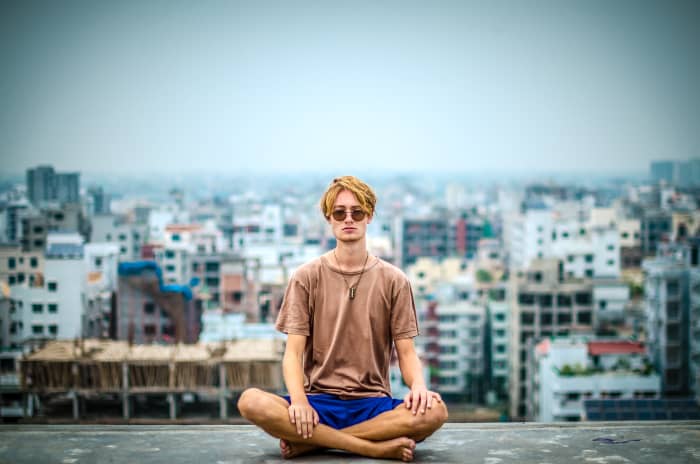 Sukhasana or easy posture for sitting cross legged on the floor for doing yoga, pranayama or meditation