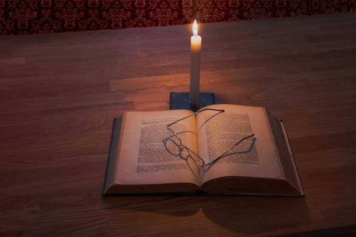 There was a time that only candlelight could provide an illuminated page in the dark. Now readers have the benefit of utilizing a reading light that clips on to the book.