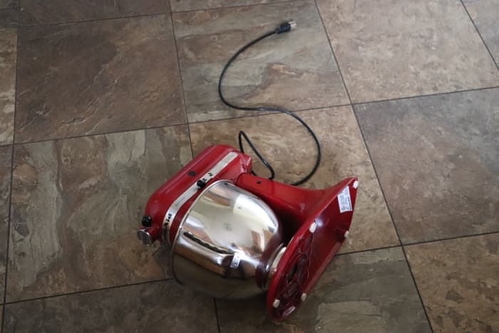 Our stand mixer crashed to the floor, damaging a tile. Fortunately, no one was injured and no damage occurred to our KitchenAid in the fall from the counter.