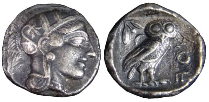 An Athenian “Owl” tetradrachm from after 499 BC, showing the head of Athena and the owl on the reverse.