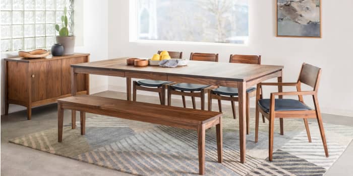 Handcrafted solid wood is inspired by Mid-Century modern wood furniture. The dining table is the solid top and has the extension leaves.