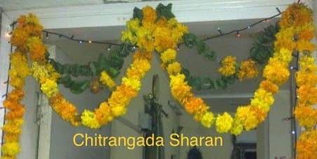 Mangoes leaves are used to decorate entrance doors and they are called Toran