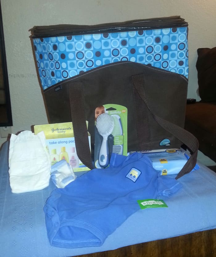 These are a few of the things you can include in the game. Open the packages and add a baby bottle and pacifier.
