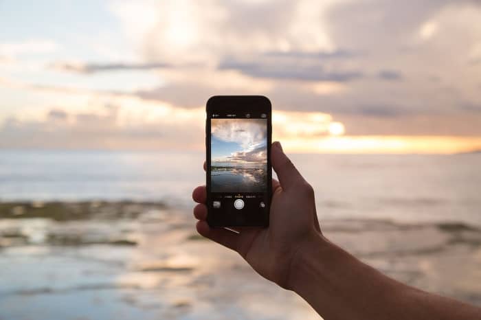 It would be a shame to be unable to photograph a beautiful scene because a device has no power. Nanogenerators driven by human motion may solve this problem.
