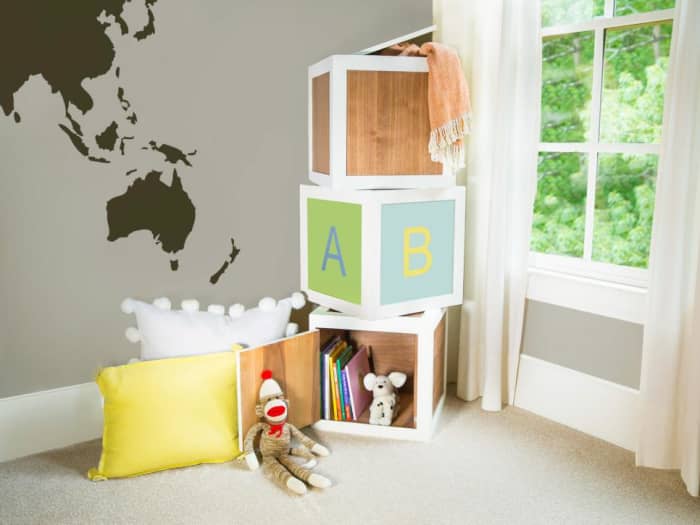 For your child's play storage, make a package of letter blocks. Paint over the letters to use the bricks as end tables when they're older. This is a single block's set of instructions.