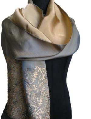 The rich texture of this silk and damask like pattern make this scarf very formal fashion statement.