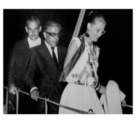 Princess Grace using a scarf for an arm sling - note the silk scarf is from the legendary French designer Hermes