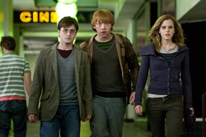 The film finally sees Radcliffe (left), Grint and Watson (right) out in the real world with their magic wands ready for a fight...