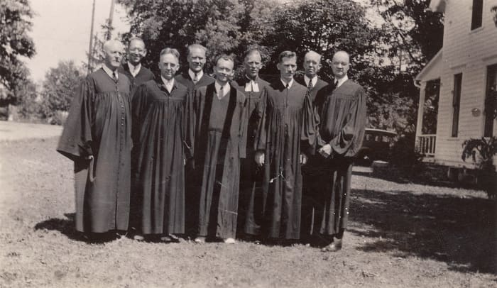 The Frohne family includes a long line of ministers. Left to right: Rev. Theo Frohne, Rev. Rudolph Gruenke, Rev. Victor Frohne, Rev. Arnold Schultz, Rev. Gilbert Frohne, Rev. Armin Frohne, Rev. Norman Schultz, Rev. Albert Meyer, Rev Richard Fillbrant