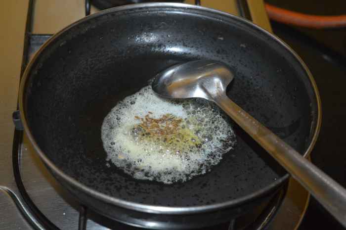 Add cumin seeds. Allow them to crackle.