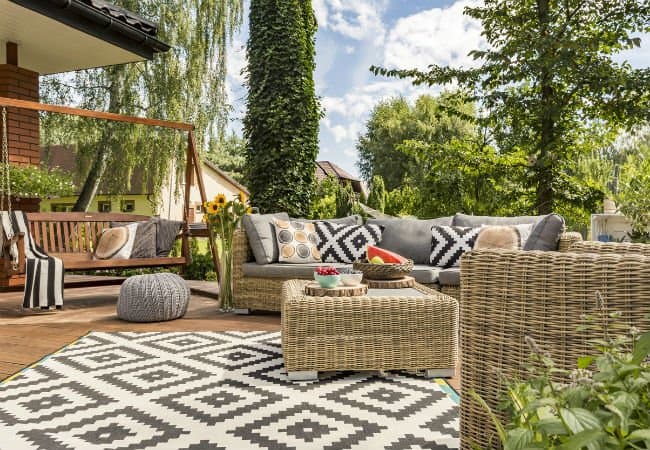 Are you getting ready to spend a lot of time outdoors this season? With a rug that can withstand the elements, you can add color and indoor warmth to your deck, porch, or patio.