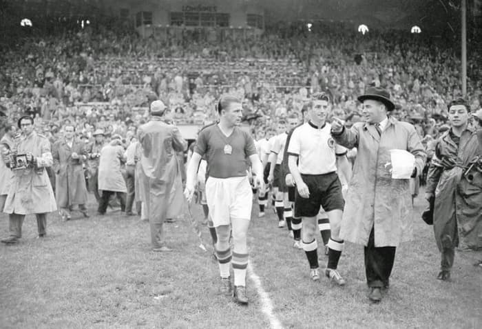 Puskás leads out the Magical Magyars (the Golden Team) for the 1954 World Cup Final.