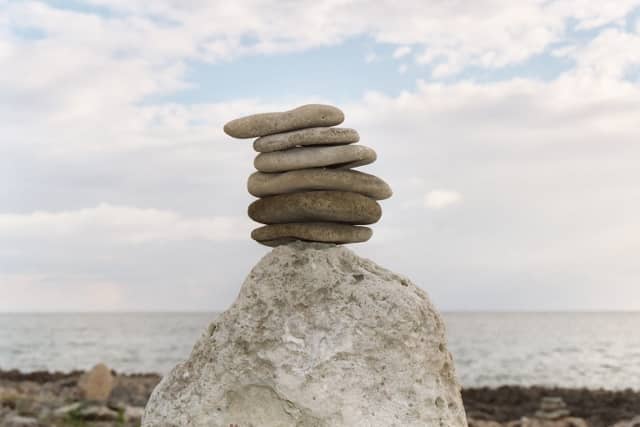 Stone balancing is a popular art. These balanced stones were photograped by the author at the spa resort, "Jackie's on the Reef," in Negril, Jamaica, West Indies.