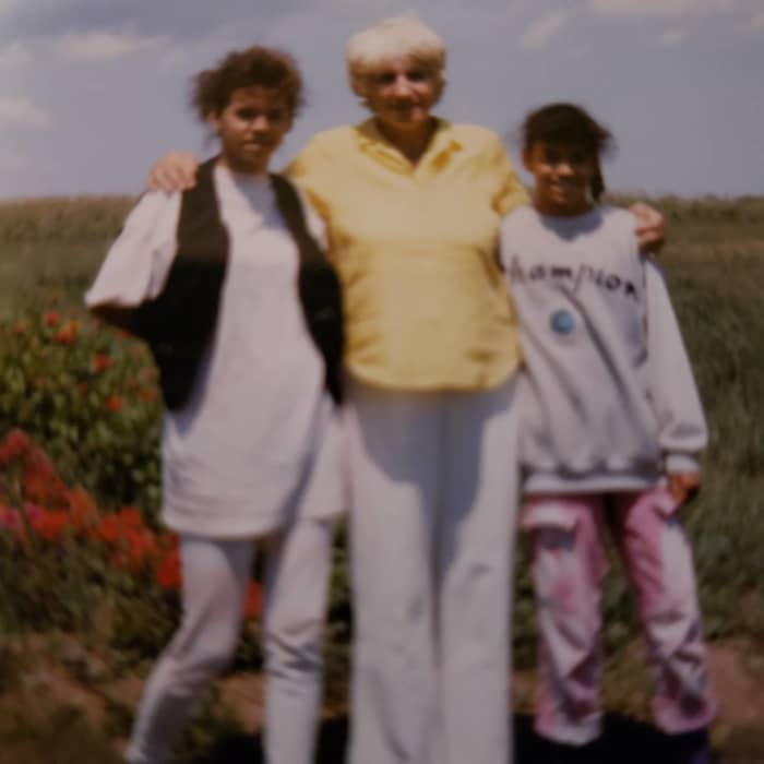 Mom between Terry on the left and Mary on the right. Taken on Patty's farm in the late 1980s