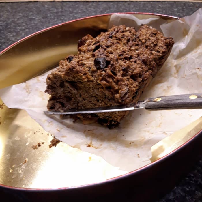 I store a knife in the tin so that it's ready to slice the bread without my having to search for a clean knife.
