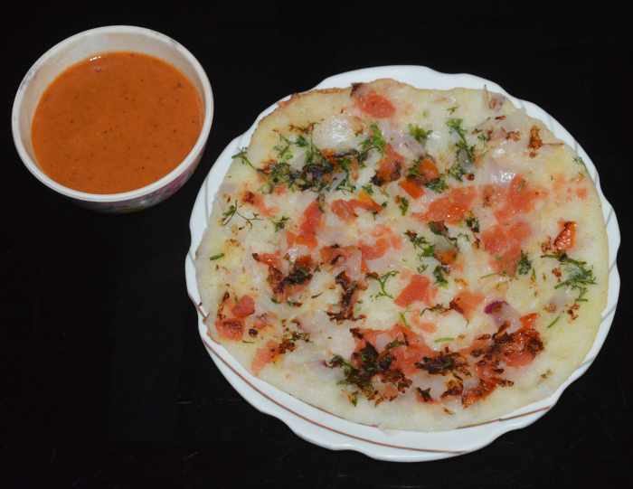 When both the sides are cooked and golden brown, remove the uttapam with a spatula and place it on a serving plate. Serve it hot with chutney. Enjoy!