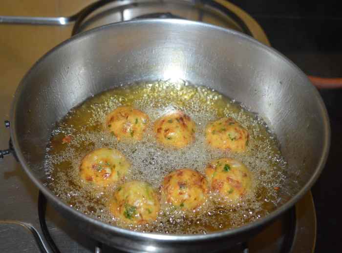 Fry them until they become golden brown all over and crunchy.