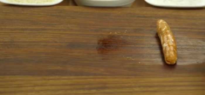 Step 2: Take a small amount of the mixture in your hands and shape it into a cylinder.