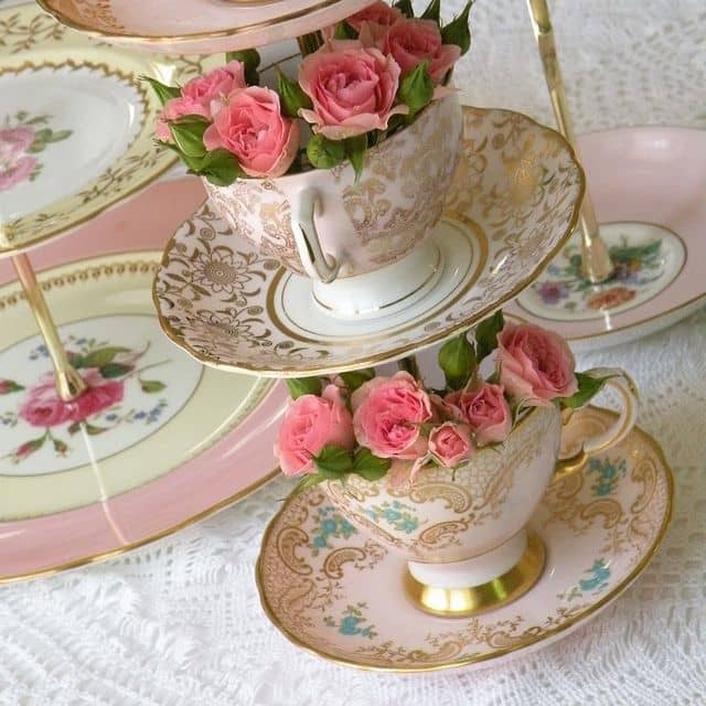 This lovely centrepiece has been made by drilling through 3 teacups and saucers and then stacking them on a metal rod.