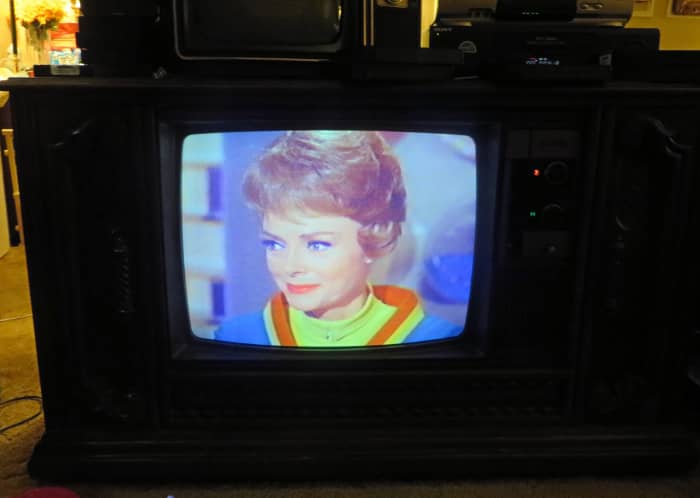 June Lockhart, on the 1980 Quasar Color Console TV WL9439SP. this television is one of the early Quasar Dynacolor designs, Chassis Number SLTS976FA03. Time for her once every 41-year cleaning.