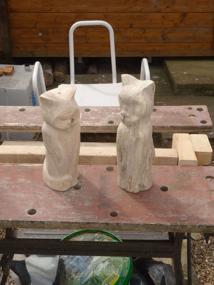 On the left, a green ash Persian, on the right, a spalted cherry moggy. They seem to be discussing their options while I consider mine.