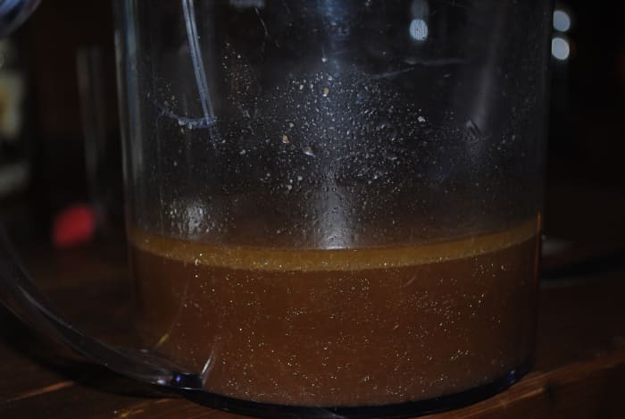 The juices - about a cup and a half - in the fat seperator. The layer on top is the fat that rendered from the roast. Considering the size - it's not much.