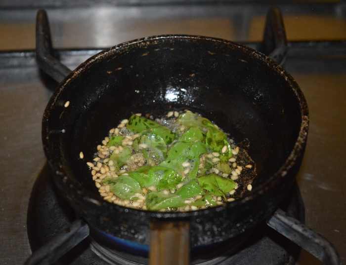 Step four: Make the tempering as per instructions. Pour it on the dhokla. 