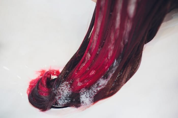 Red can be a stubborn color that is resistant to fading out completely with washing.
