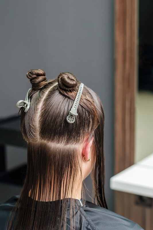 Sectioned hair is much easier to apply bleach and dye to.