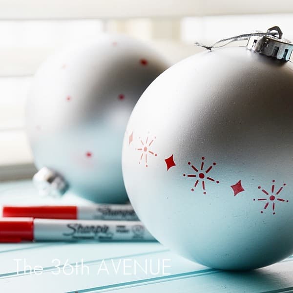 Use sharpies to revive and enhance a Christmas ball. Metallics would be perfect for this kind of project. Ypu do not have to freehand draw. Use a stencil instead.