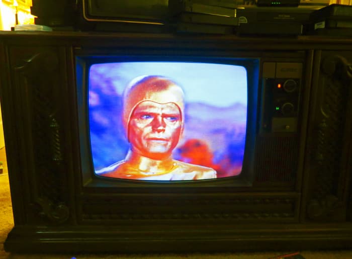 The Golden Man, Lost in Space, playing on the Quasar Color Console Television Model WL9439SP, The Quasar was made September 1980, this television is one of the early Quasar Dynacolor designs, Quasar Chassis Number SLTS976FA03.