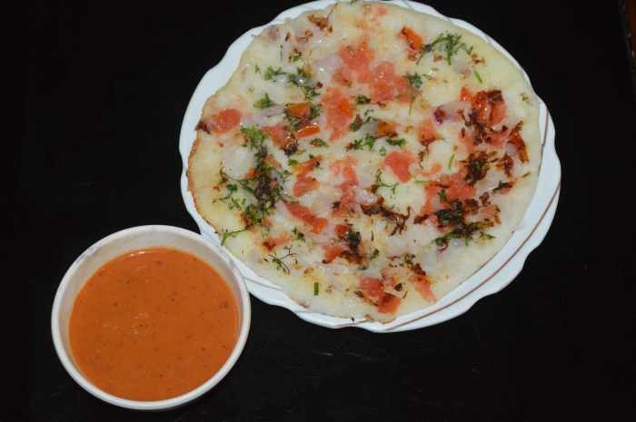Tomato onion chutney served with uttappa