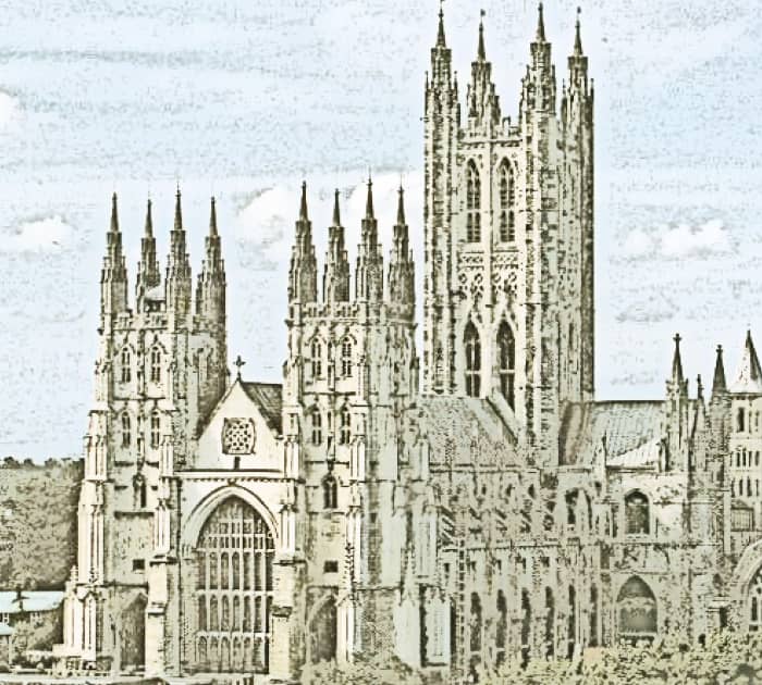 Up the road you can see a cathedral like structure, with shops all around, with doors open, and large, lovely tables of food on them outside the shops, and the cathedral, and everything is beautifully illuminated.