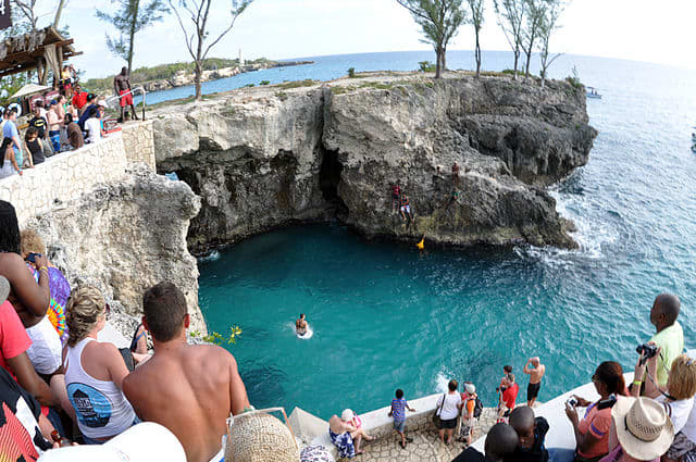 Partying at Ricks Cafe while divers jump from the cliffs on Negril's West End