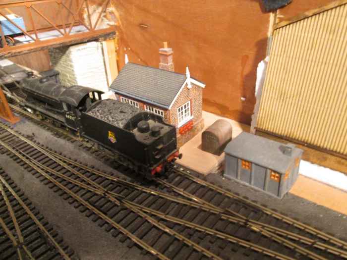 J39 64710 passes Ainthorpe Junction signal cabin. Gnger's hut and coal storage shed have been added to make up the scene ...