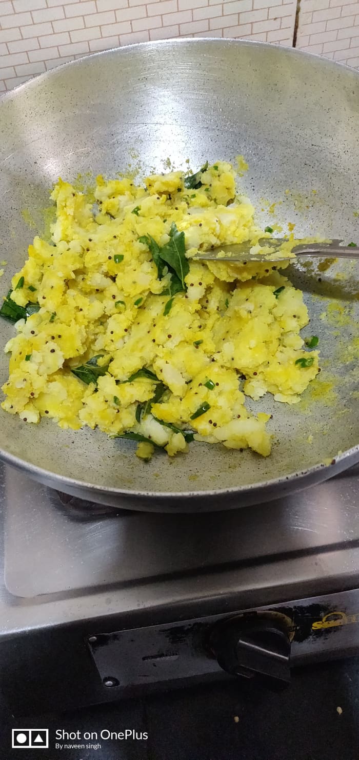 Sauté & tempered potatoes with curry leaf, chopped chillies,chopped garlic and little asafetida, turmeric powder &salt.