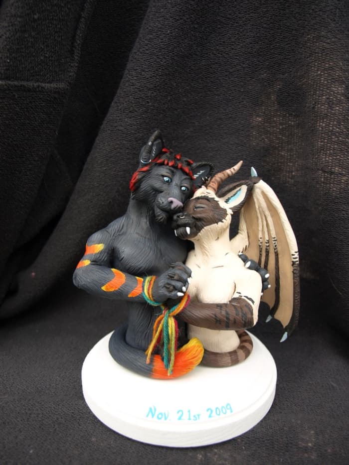 These furry characters are shown practicing a handfasting ceremony, which is a Wiccan wedding ritual.