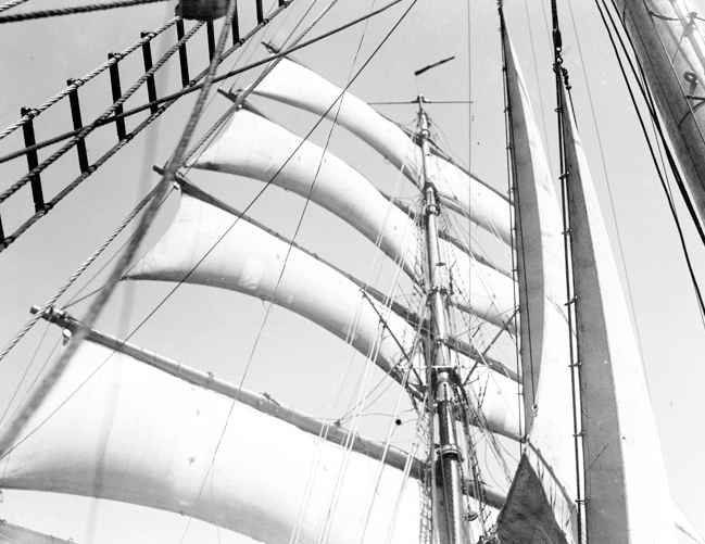 The mast of a tall ship taken aback. Note how the sails push against the mast--they aren't meant to do this.