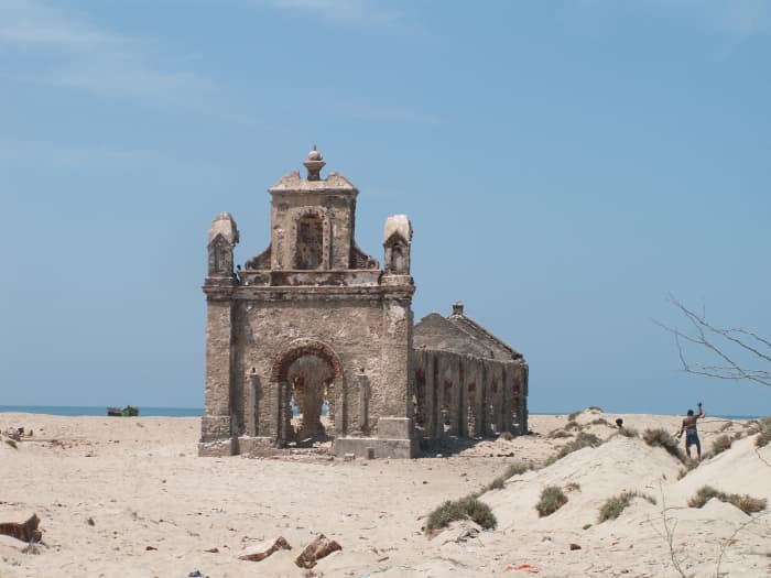 Dhanushkodi has a railway station, a church, a temple, a post office, a small railway hospital, a higher secondary school, and houses, among other things.