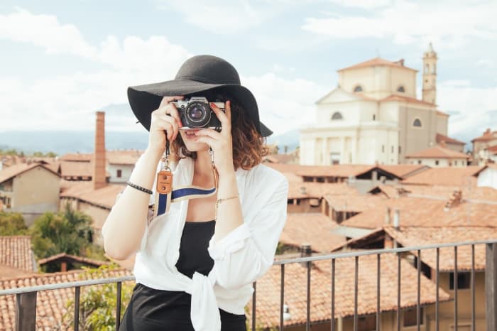 Taking photographs when traveling alone can be awkward, there are limitations when you have no friends or family with you.