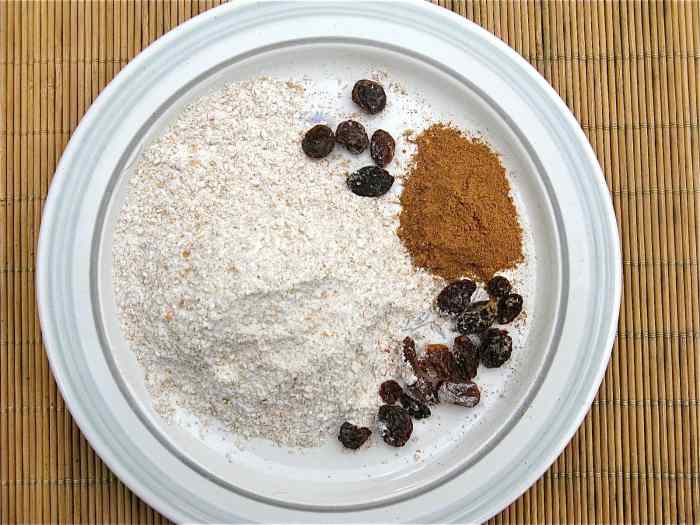 Whole wheat flour, pumpkin pie spice, and raisins