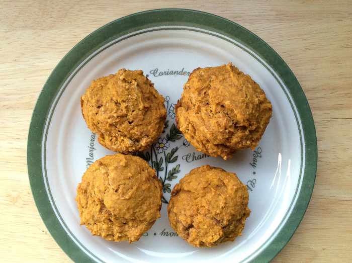 Pumpkin spice muffins made with whole wheat flour and brown, unrefined sugar