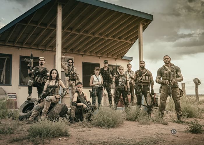 Chris D'Elia can still been seen in promo shots online, but I believe all traces of the actor were removed within the film.