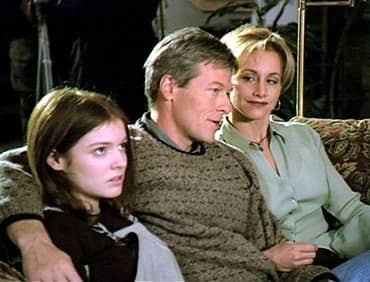 Paige (Aubrey Dollar) would rather be doing something different as her father, Mike (Jack Wagner) receives praise for his work at the ski resort, while Emily (Gabrielle Carteris) beams proudly.