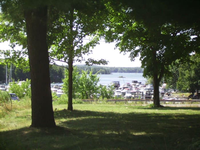 View of 1000 Islands and St. Lawrence River from front yard of Ivey Homestead in Ivy Lea, Ontario, Canada.