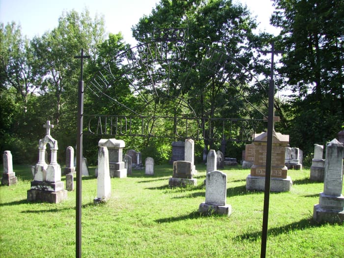 Tombstones in Holy Japanese Martyr's Cemetery in Phillipsville, Ontario, Canada.