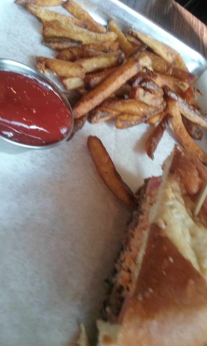 A unique and absolutely delicious Melt Kitchen & Bar restaurant food offering : duck fat fries! This can readily join a person's list of favorite things. I would put it on mine!