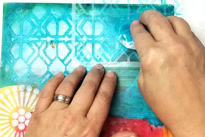 Stencils and gesso...use basic colors of gesso or add some acrylic paint to make colored gesso to use with your stencils