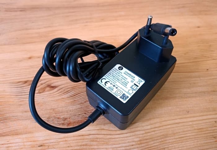 AC adaptor. The plug provided will be compatible with the country to which the vacuum is shipped